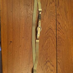Vintage Gold Mesh Belt.
First notch is at 28 inches
